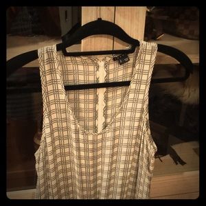 Long checkered Theory jumpsuit.